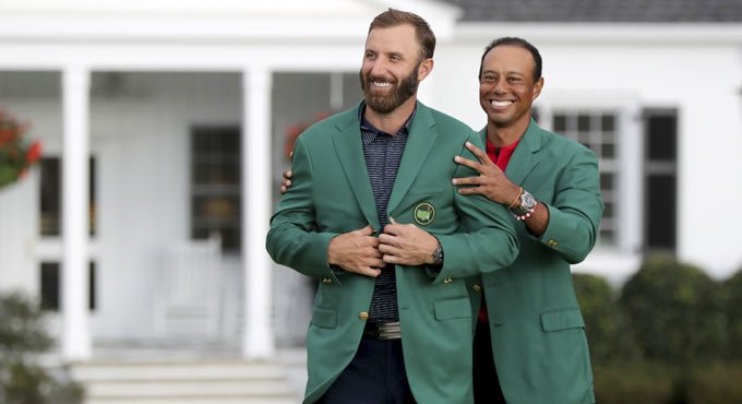 Johnson slips into Masters green jacket