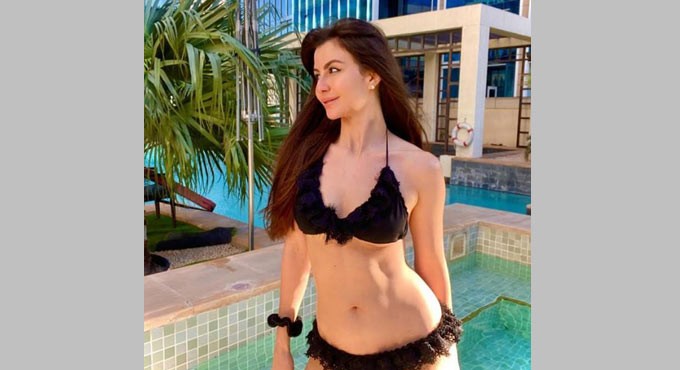 Giorgia Andriani perfectly flaunting her bikini outfits