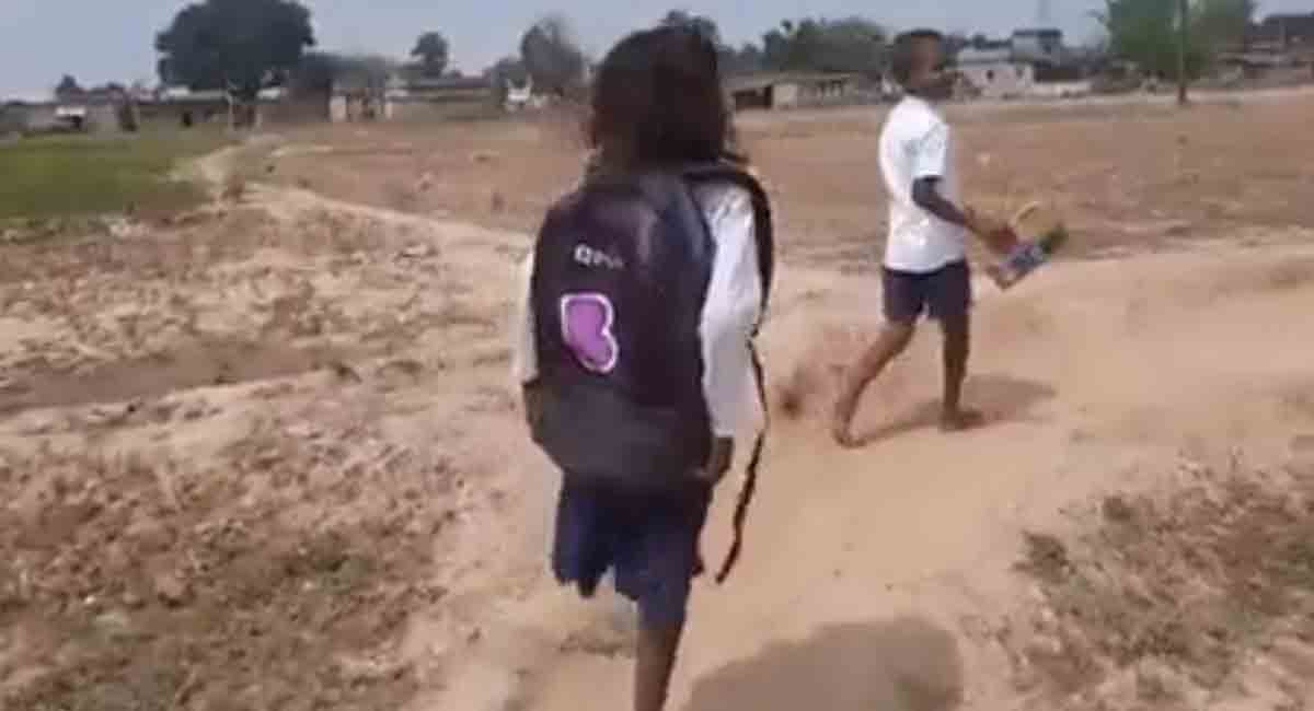 Video of determined girl hopping to school on one leg goes viral