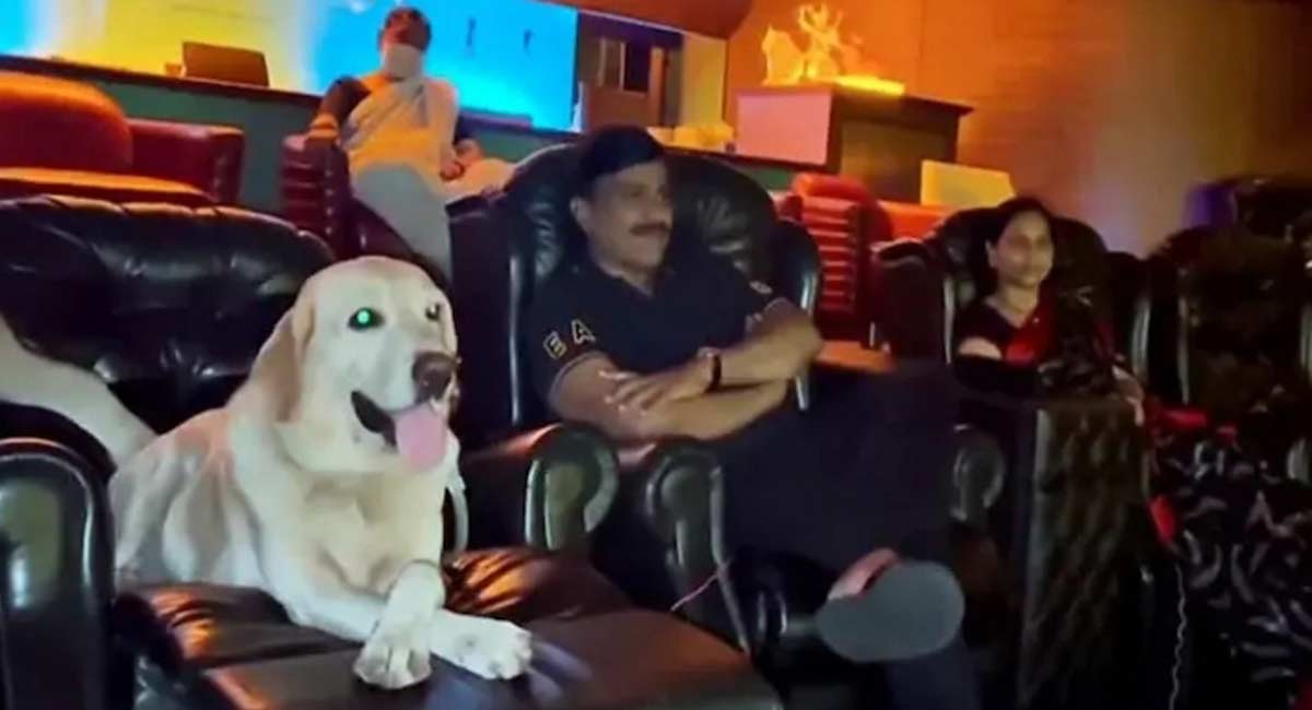Mining baron Janardhana Reddy watches ‘777 Charlie’ with pet dog