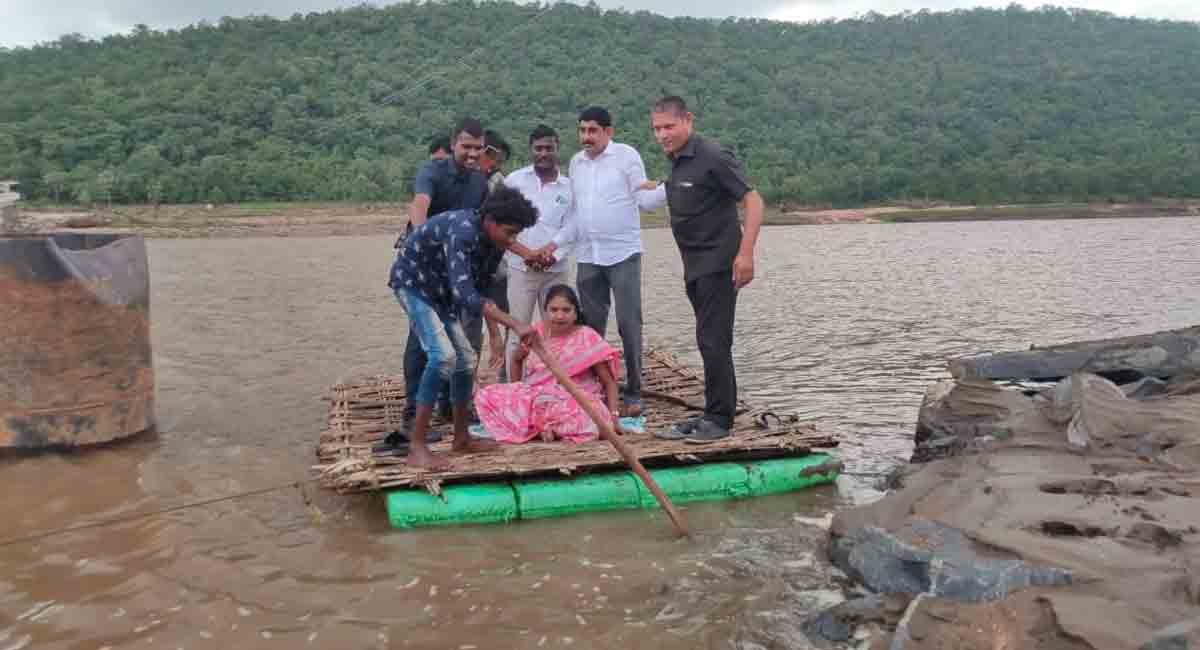 Nirmal: MLA Rekha Naik cross river by raft, wins plaudits