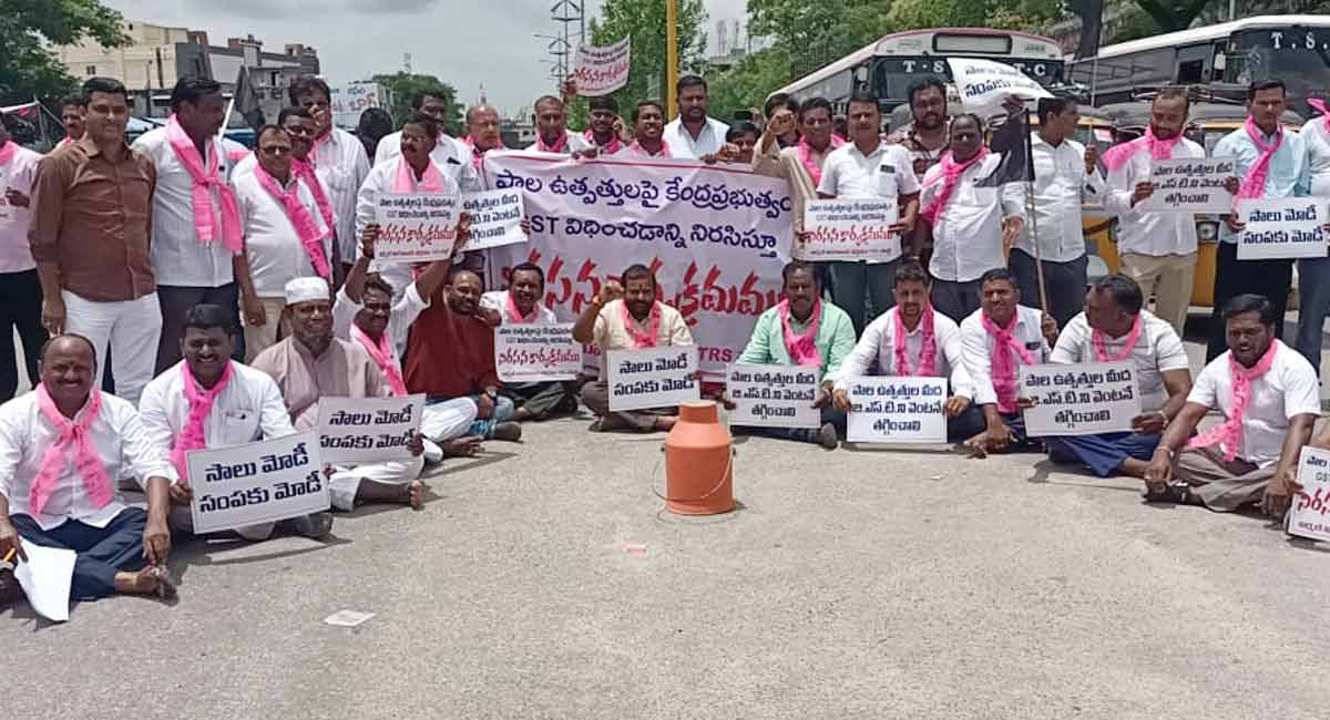 TRS activists stage protest against GST on dairy products in Nirmal