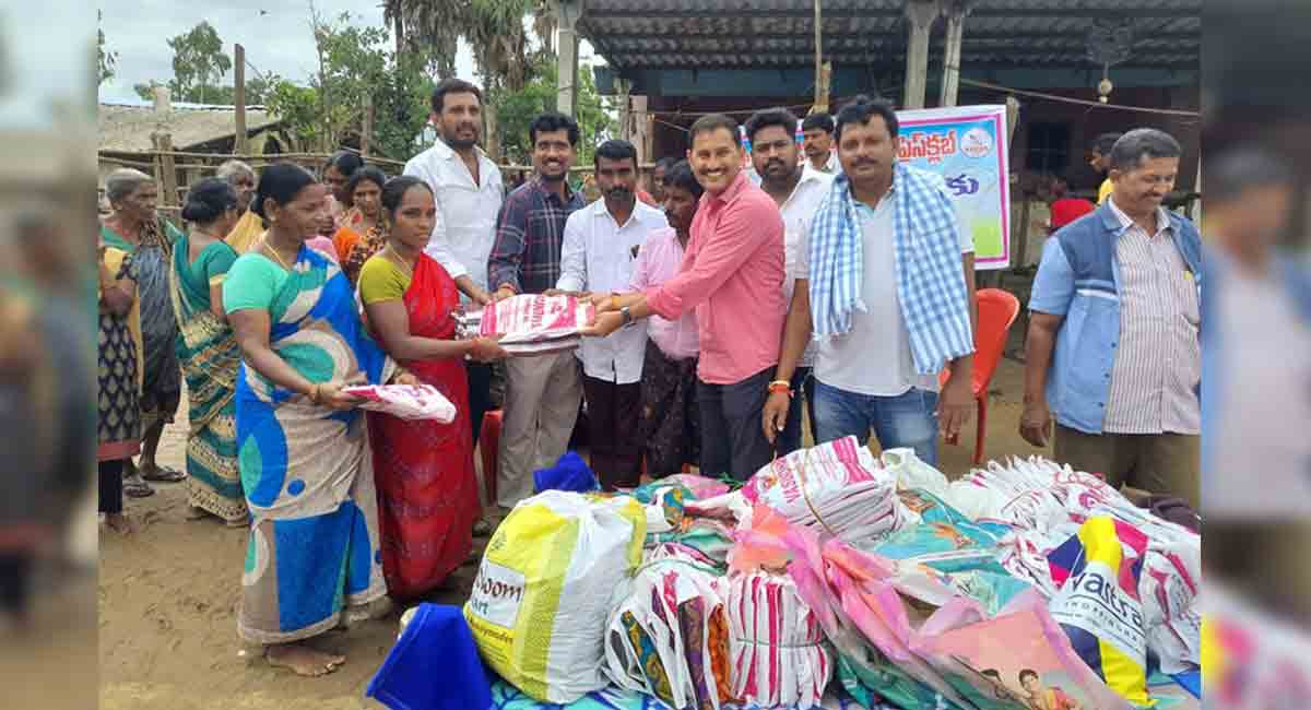 Laxmidevipally Press Club distributes clothes to flood victims in Kothagudem