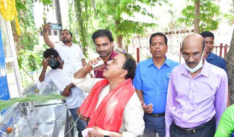 Endowments Minister A Indrakaran Reddy drinking water from newly inaugurated free water plants
