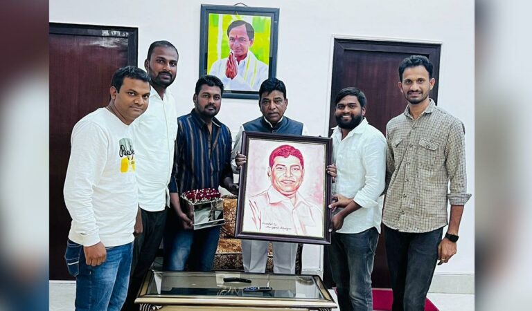 A youth presented a portrait drawn with his blood to MP Nama Nageshwar Rao in New Delhi.