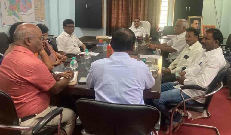 Dr Kondal Rao holding a meeting