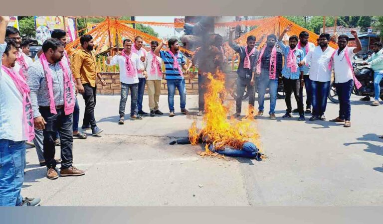 BRS activists staging protest and burning effigy of Bandi Sanjay in Peddapalli.
