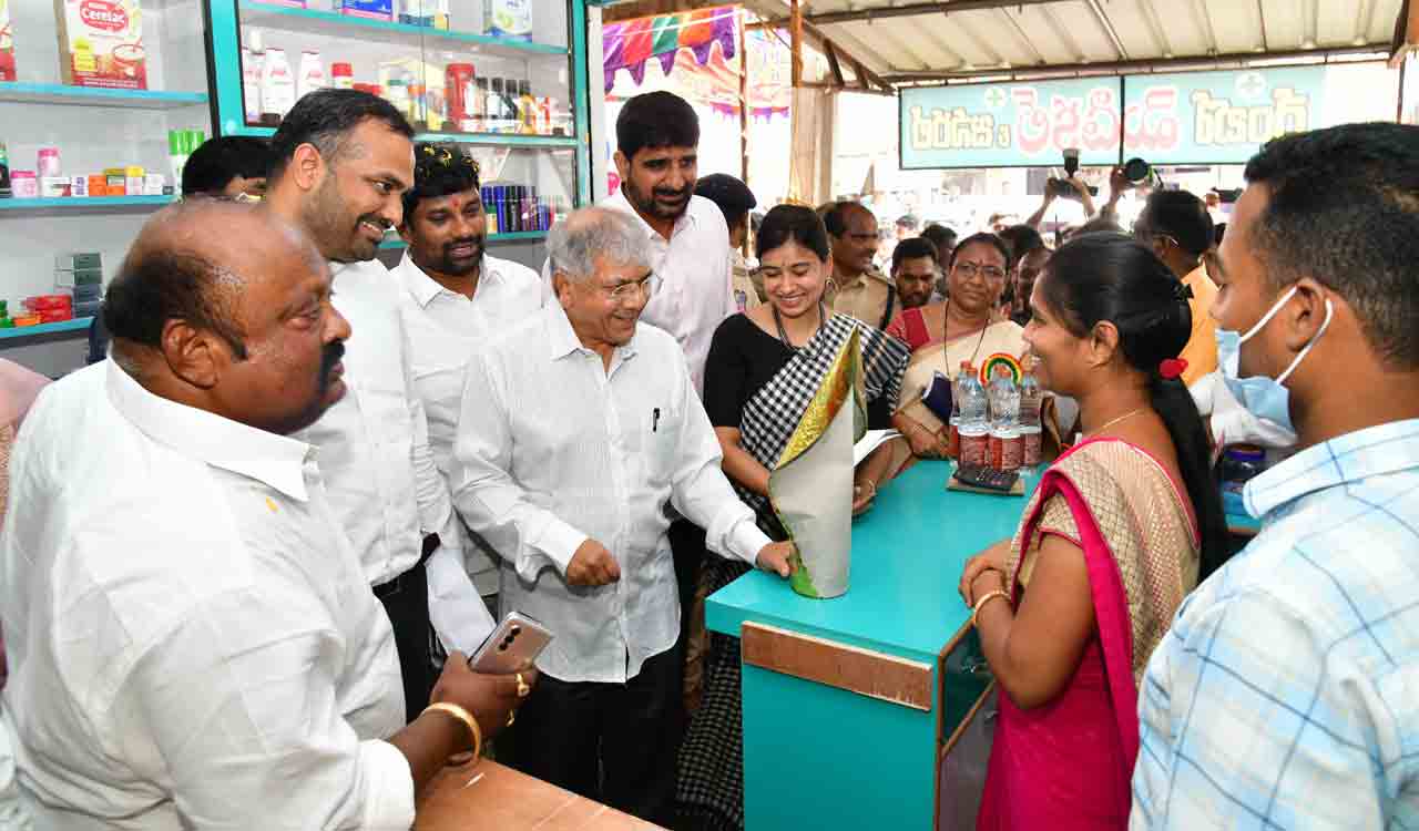 Prakash Ambedkar interacting with the owner of a kirana store established under Dalit Bandhu in Huzurabad constituency on Friday.